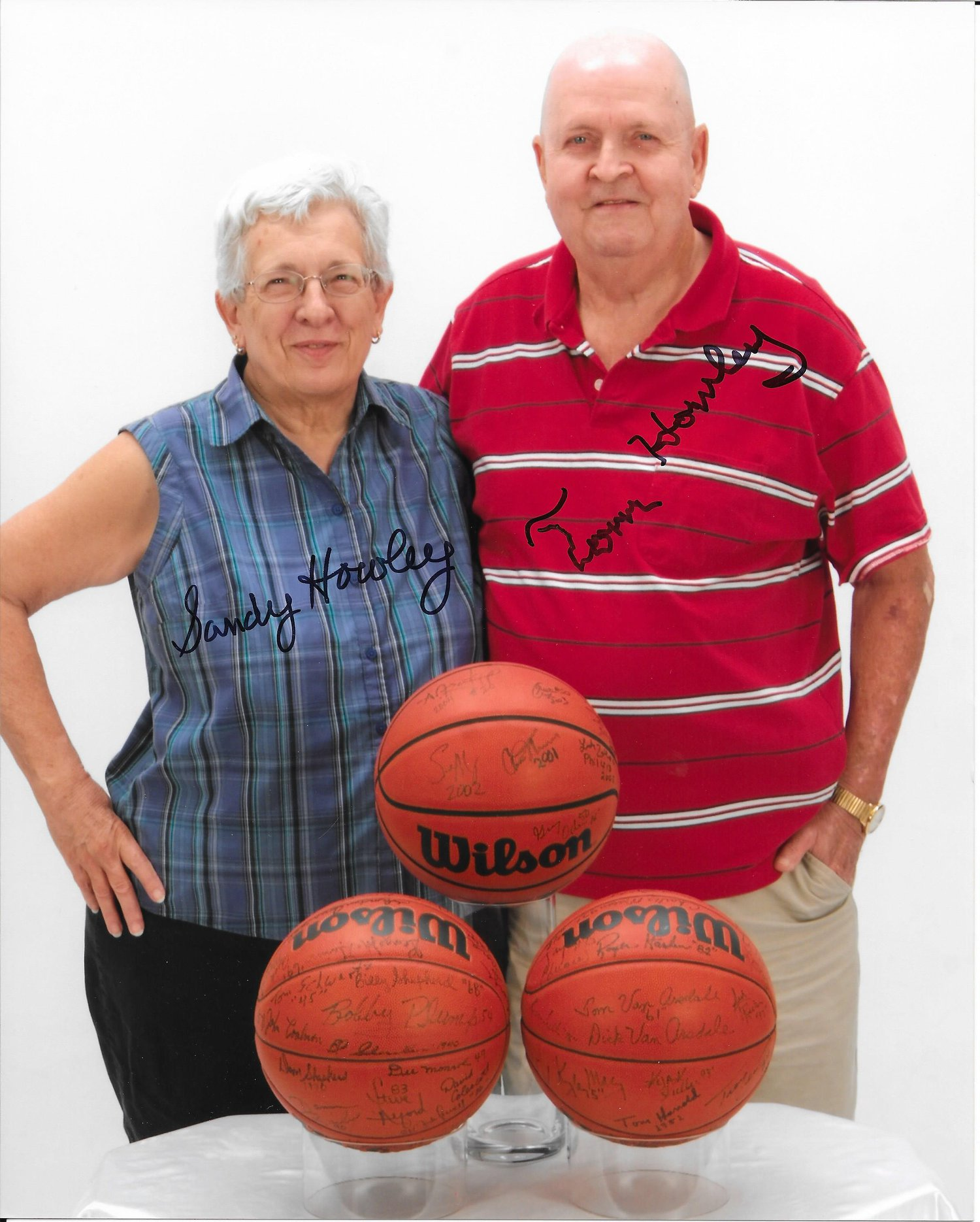 Tom & Sandy Howley Start Legacy of Mr. & Miss Basketball for Indiana Signing Basketballs